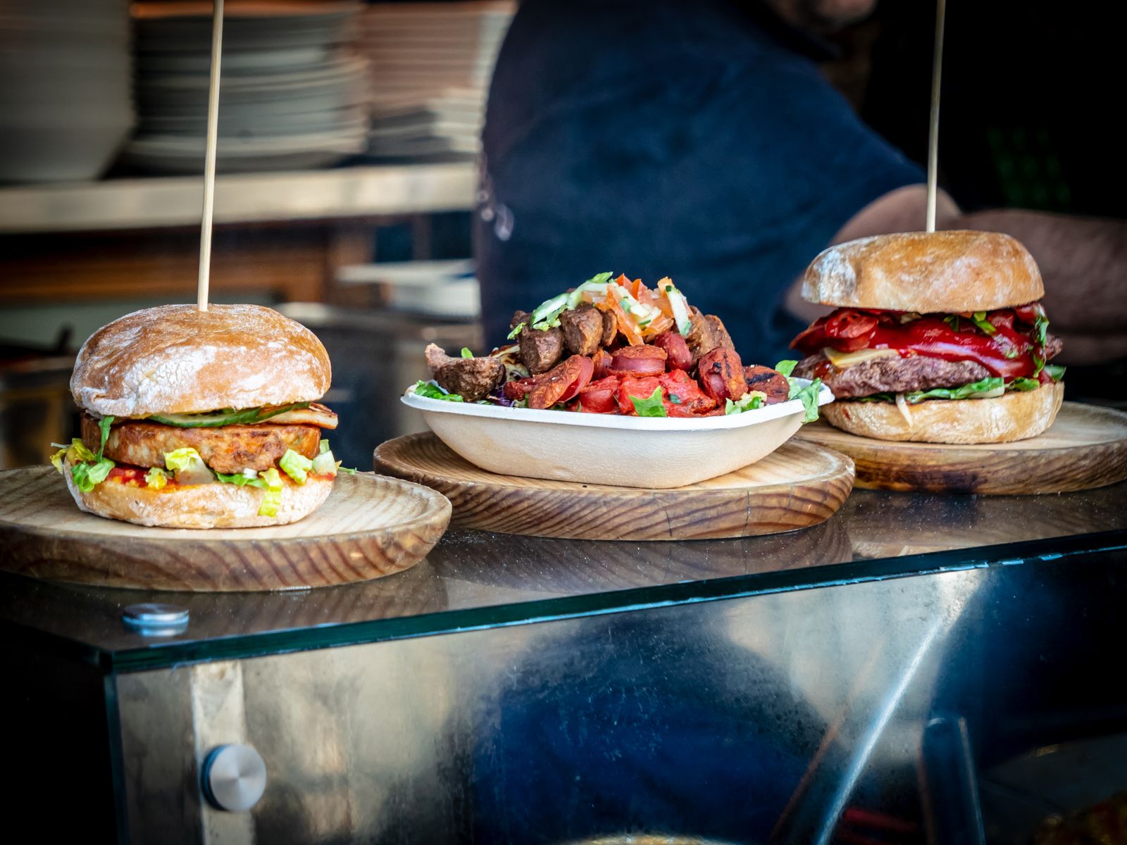 Halloumi bun and chorizo bowl served at a food truck hatch